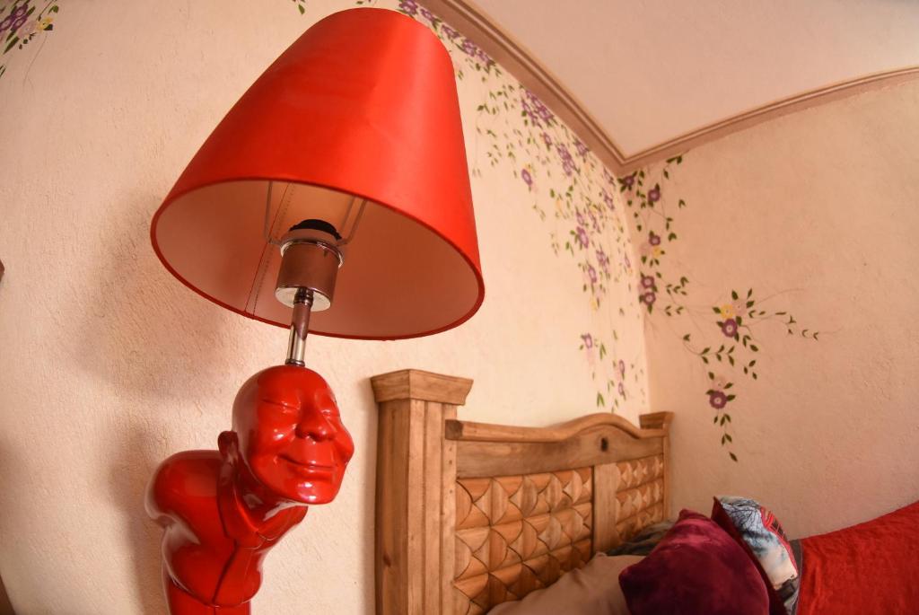 Postel nebo postele na pokoji v ubytování HOTEL CASA LIMON