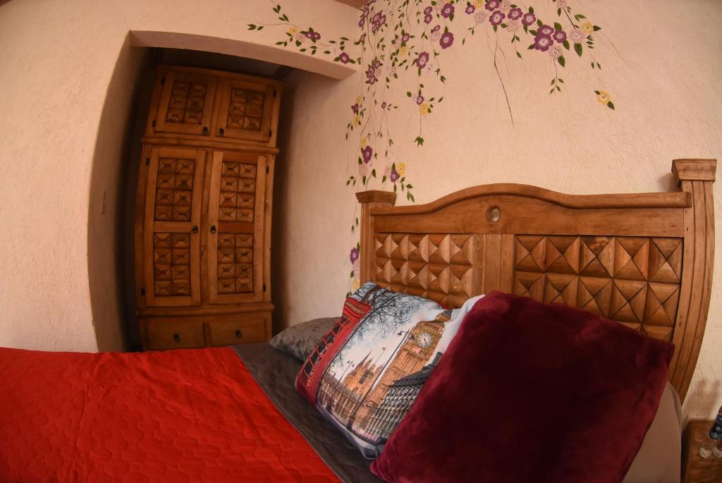Postel nebo postele na pokoji v ubytování HOTEL CASA LIMON
