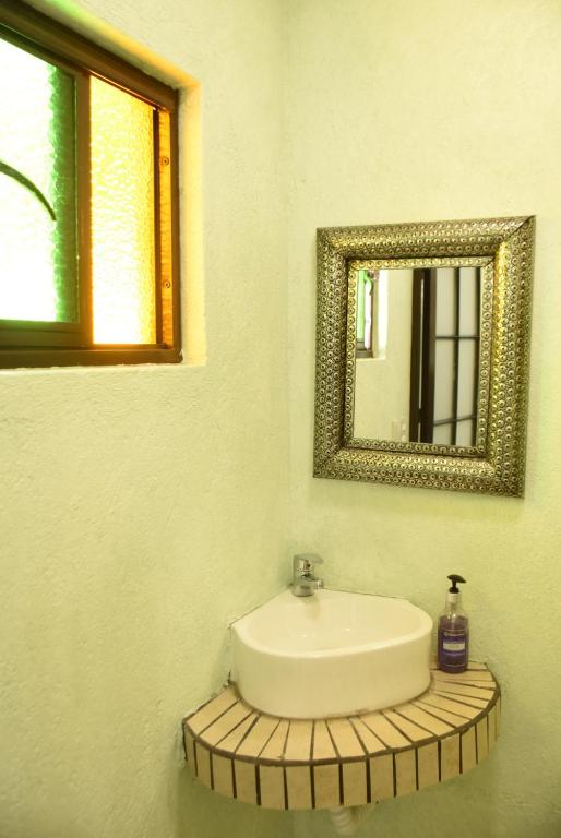 Koupelna v ubytování HOTEL CASA LIMON