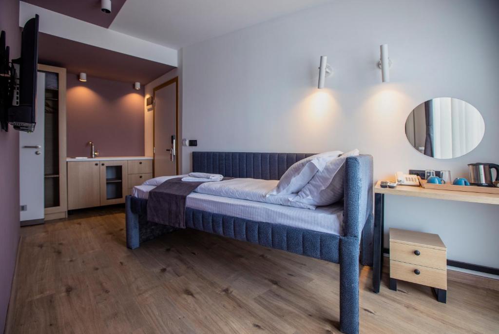 Postel nebo postele na pokoji v ubytování Hotel 4 Llulla