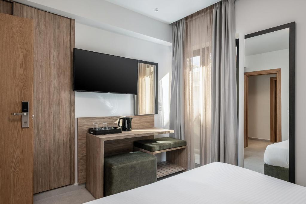 Postel nebo postele na pokoji v ubytování Morum City Hotel Chania