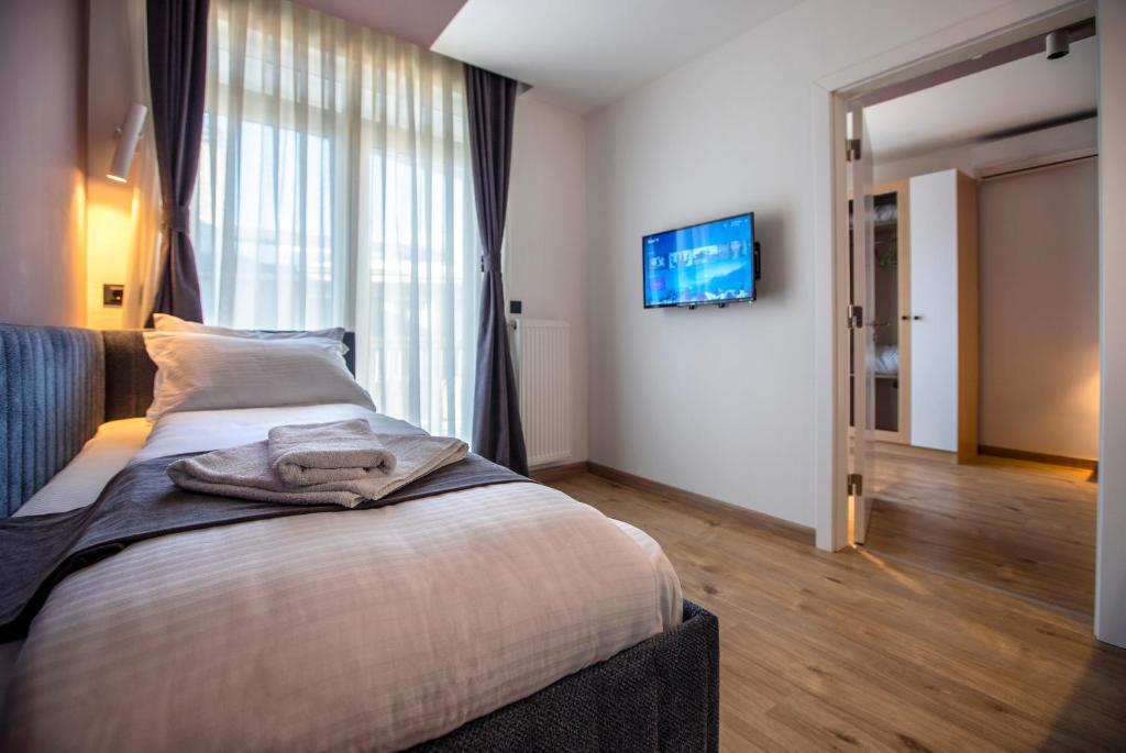 Postel nebo postele na pokoji v ubytování Hotel 4 Llulla