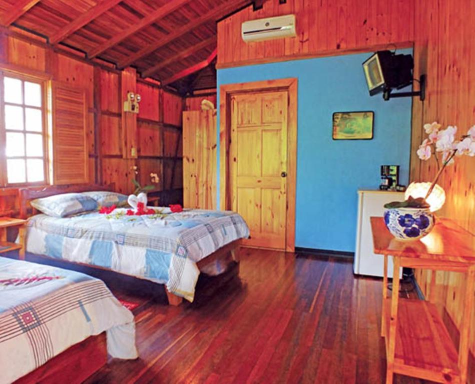 Postel nebo postele na pokoji v ubytování Ciudad Perdida EcoLodge
