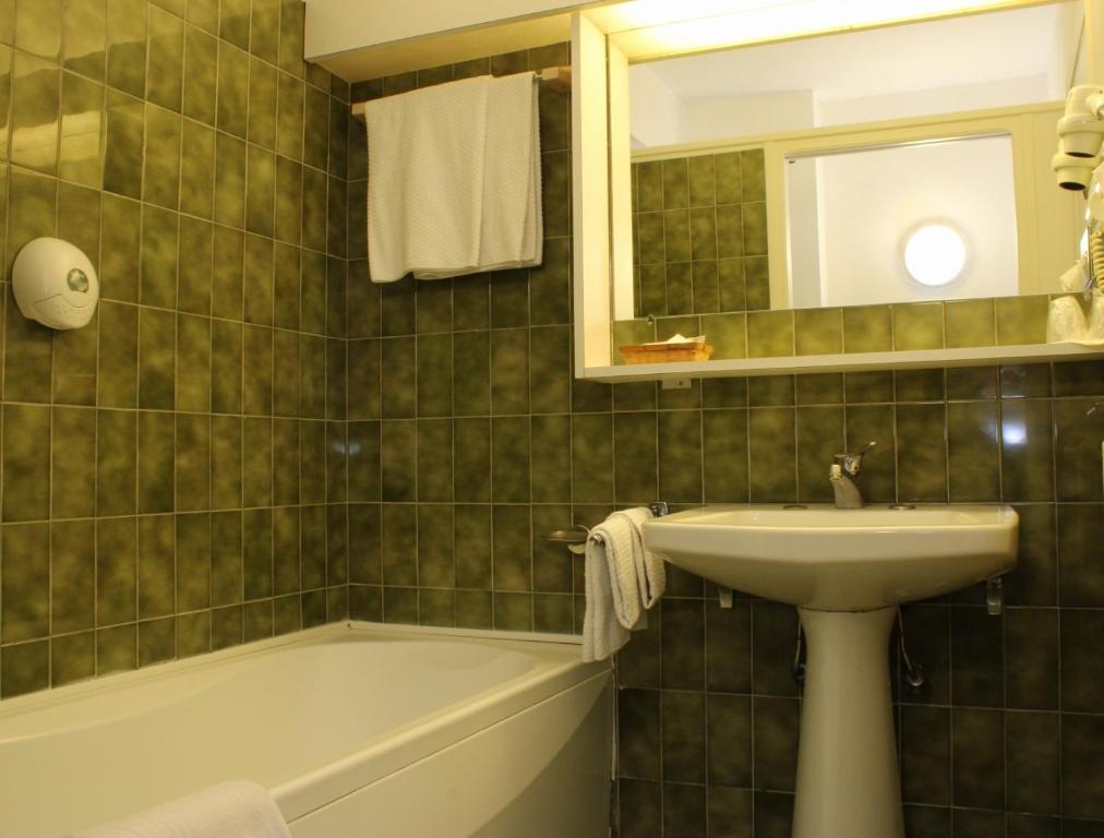 Koupelna v ubytování Hôtel Alexandra