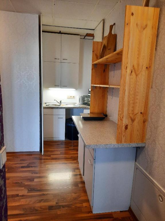 Kuchyň nebo kuchyňský kout v ubytování Easy Stay Rooms