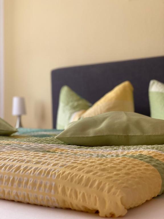 Postel nebo postele na pokoji v ubytování Hotel Am Schlosspark