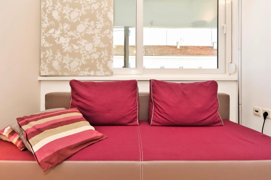 Posteľ alebo postele v izbe v ubytovaní Top Apartments Zadar