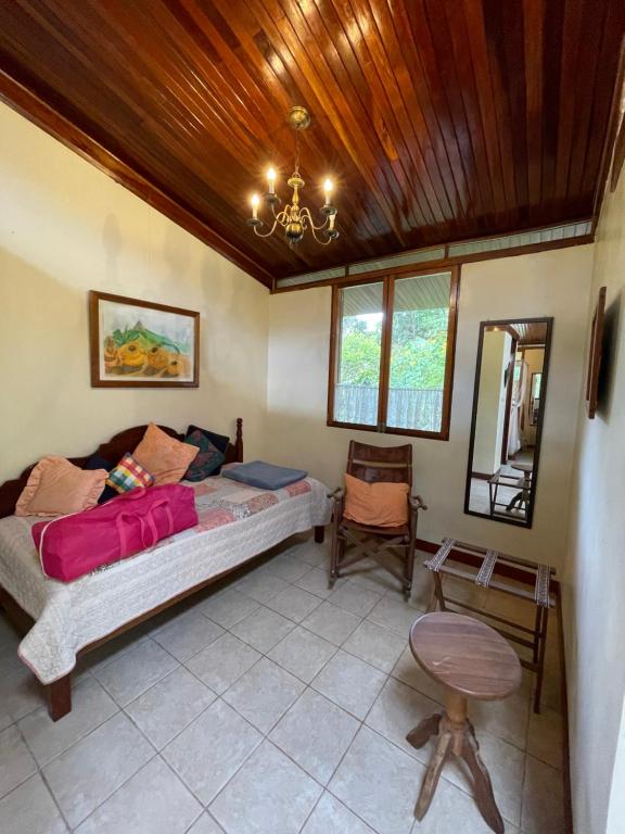 Postel nebo postele na pokoji v ubytování Finca Isla Rainforest Retreat
