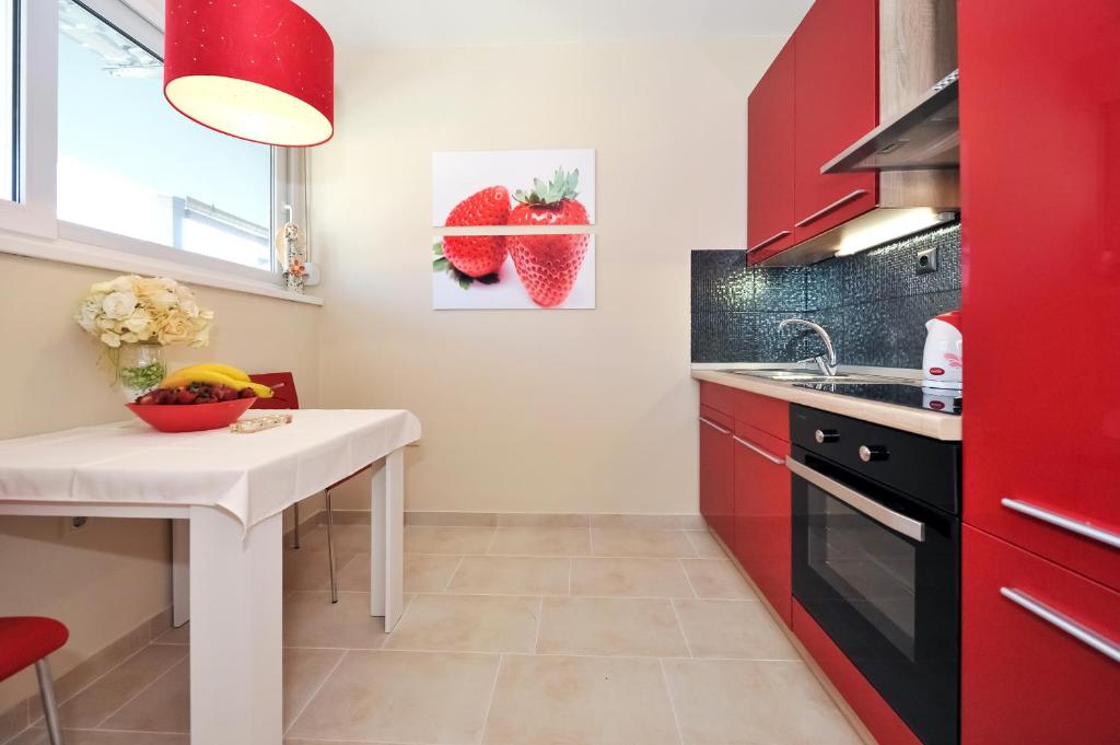 Kuchyňa alebo kuchynka v ubytovaní Top Apartments Zadar
