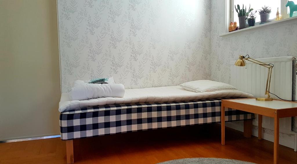 Postel nebo postele na pokoji v ubytování Gästrum Vasaloppets vintervecka