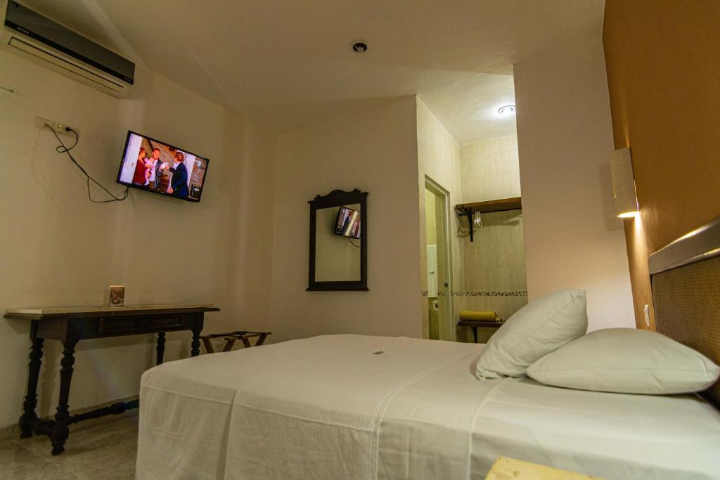 TV a/nebo společenská místnost v ubytování Hotel María Jose