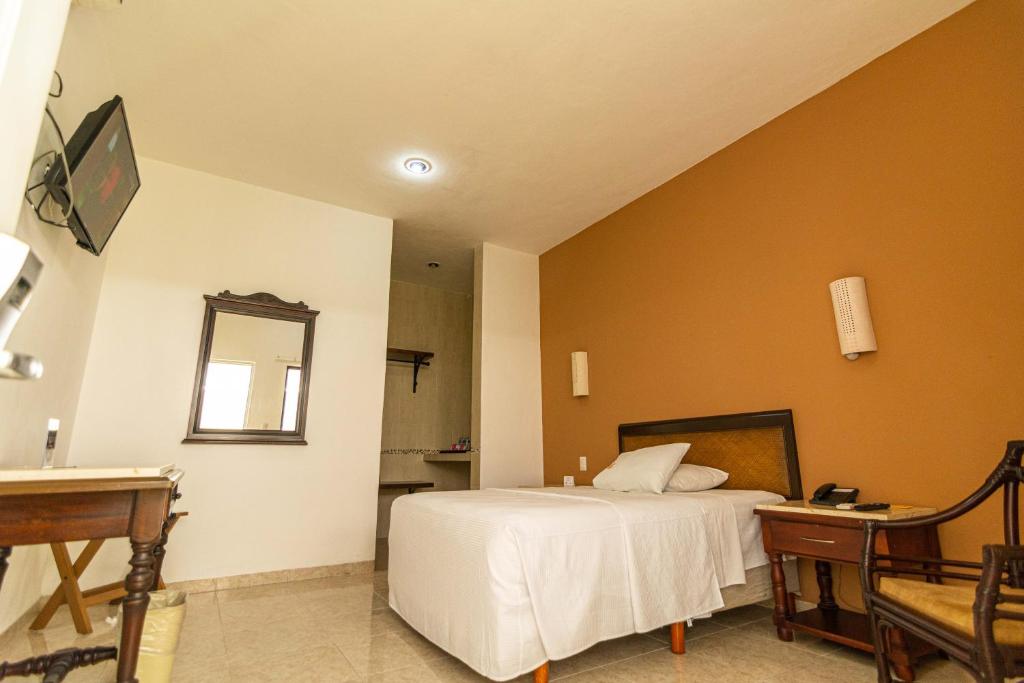 TV a/nebo společenská místnost v ubytování Hotel María Jose