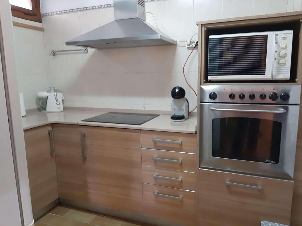 Kuchyň nebo kuchyňský kout v ubytování Habitaciones en Villa Coliving Casa Rural