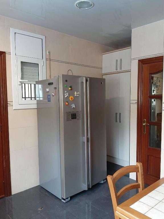 Kuchyň nebo kuchyňský kout v ubytování Habitaciones en Villa Coliving Casa Rural