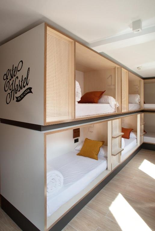 Postel nebo postele na pokoji v ubytování Toc Hostel Sevilla