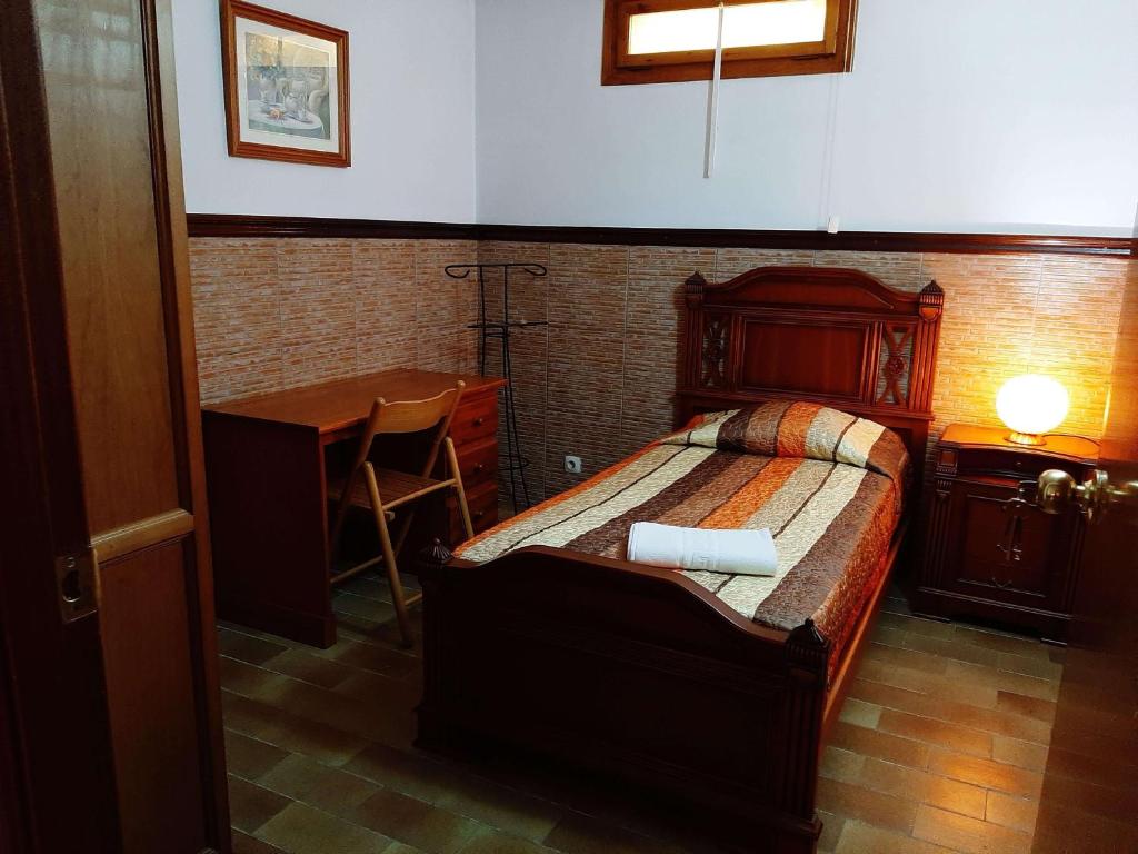 Postel nebo postele na pokoji v ubytování Habitaciones en Villa Coliving Casa Rural