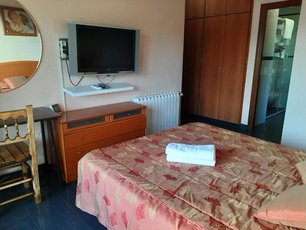 Postel nebo postele na pokoji v ubytování Habitaciones en Villa Coliving Casa Rural