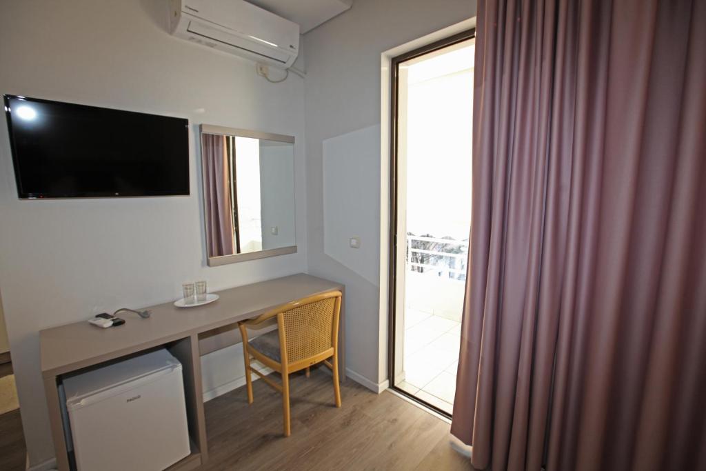 TV a/nebo společenská místnost v ubytování Star Hotel Saranda
