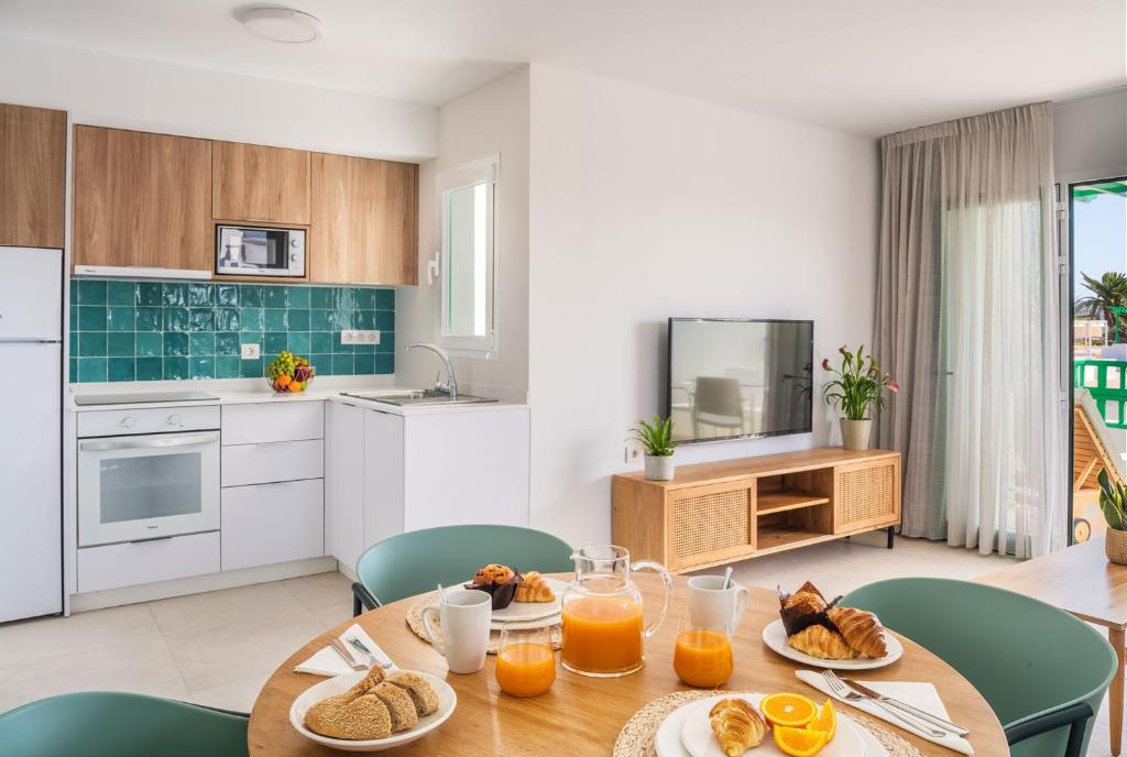 Kuchyň nebo kuchyňský kout v ubytování Nazaret Apartments