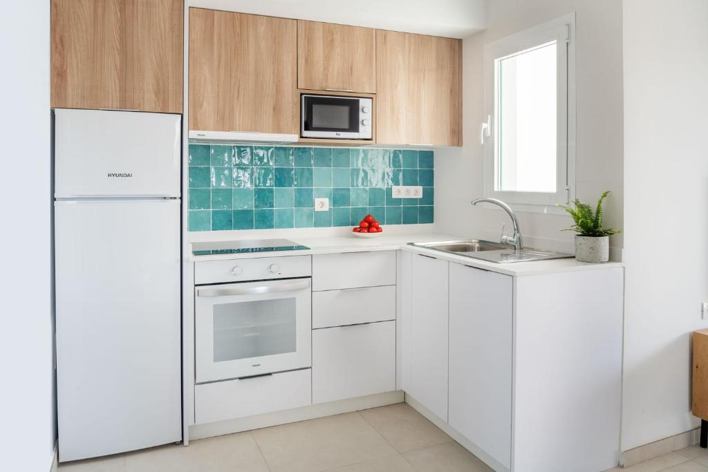 Kuchyň nebo kuchyňský kout v ubytování Nazaret Apartments