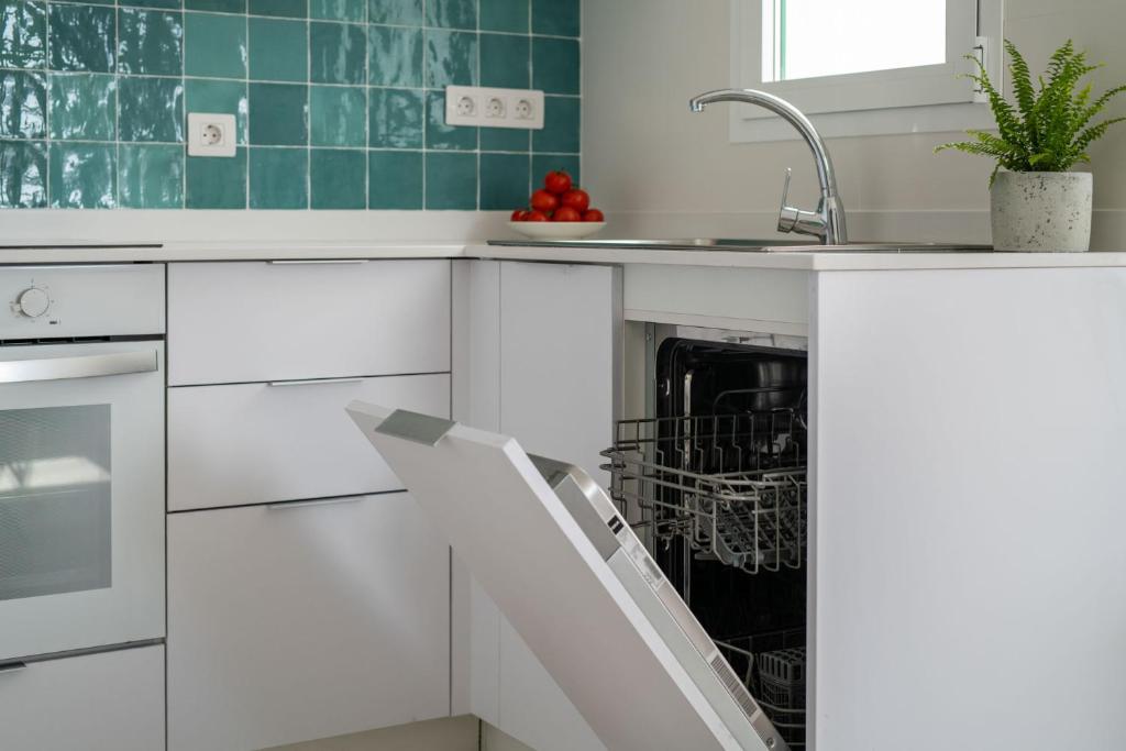 Kuchyň nebo kuchyňský kout v ubytování Nazaret Apartments