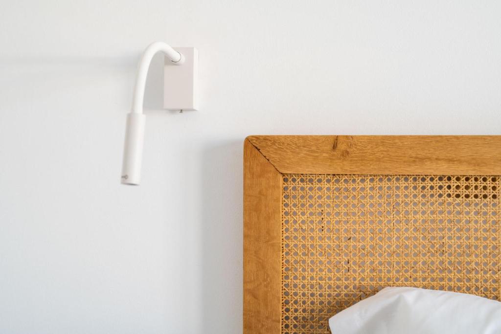 Postel nebo postele na pokoji v ubytování Nazaret Apartments