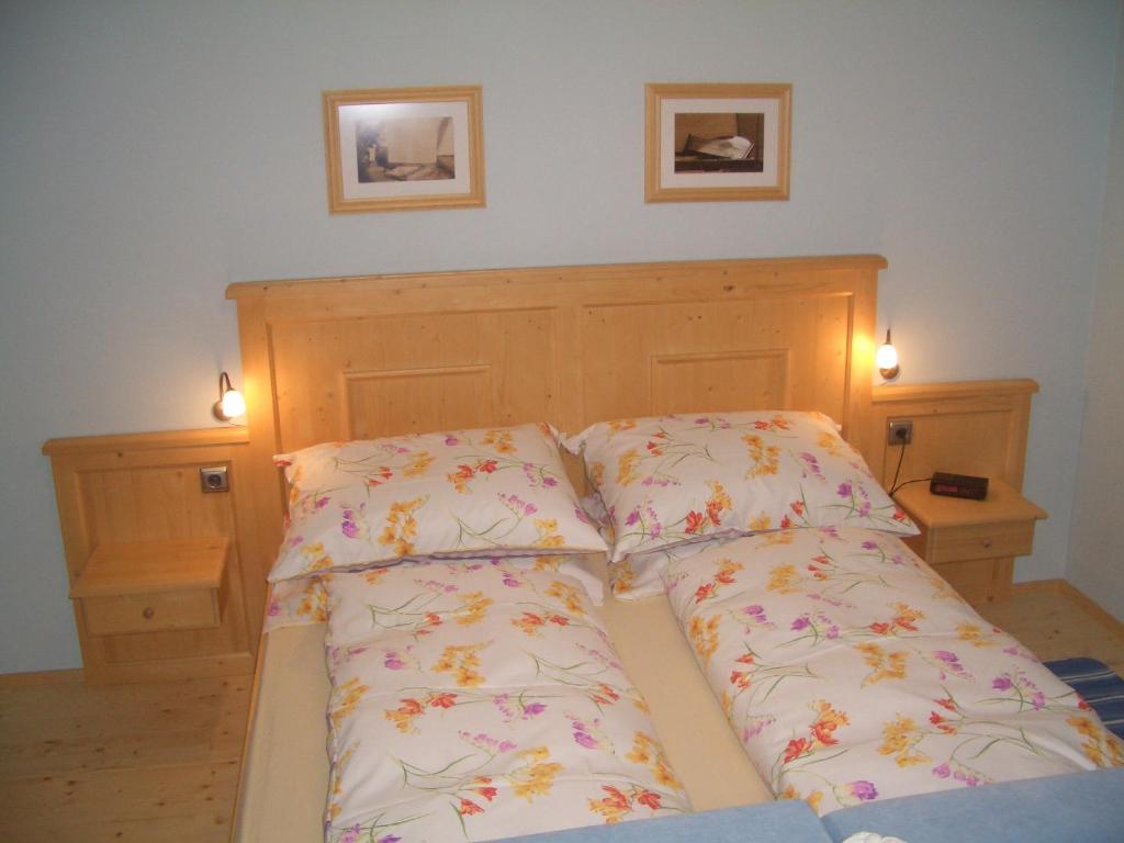 Postel nebo postele na pokoji v ubytování Haus Ortner