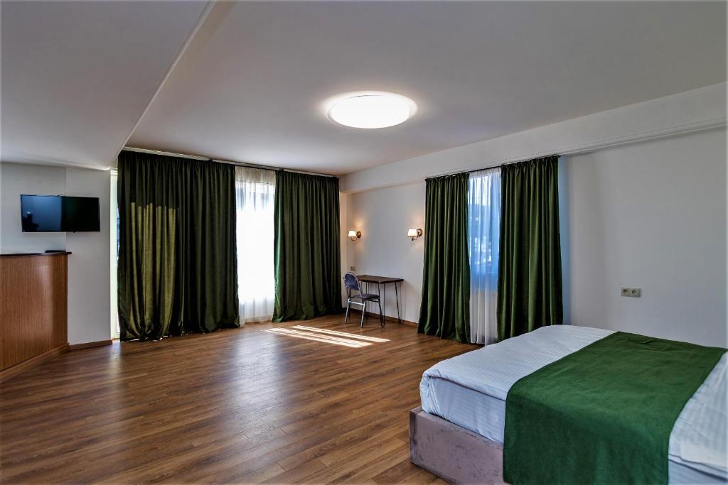 Postel nebo postele na pokoji v ubytování B&B Old Tbilisi