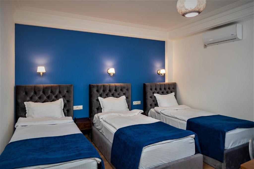 Postel nebo postele na pokoji v ubytování B&B Old Tbilisi