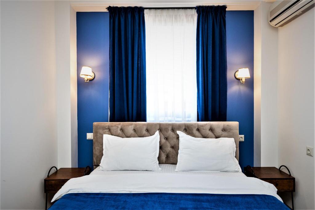 Postel nebo postele na pokoji v ubytování B&B Old Tbilisi