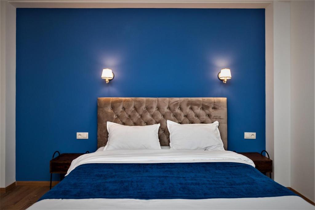 Postel nebo postele na pokoji v ubytování B&B Old Tbilisi