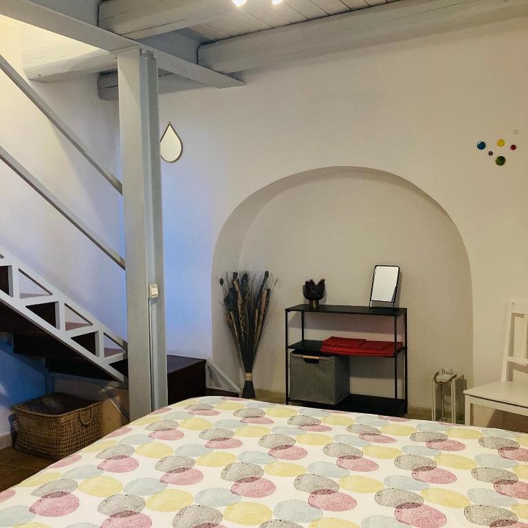 Postel nebo postele na pokoji v ubytování CIRIBACCO ROOMS