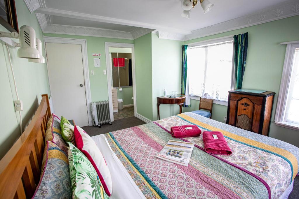 Postel nebo postele na pokoji v ubytování Richmond Guest House