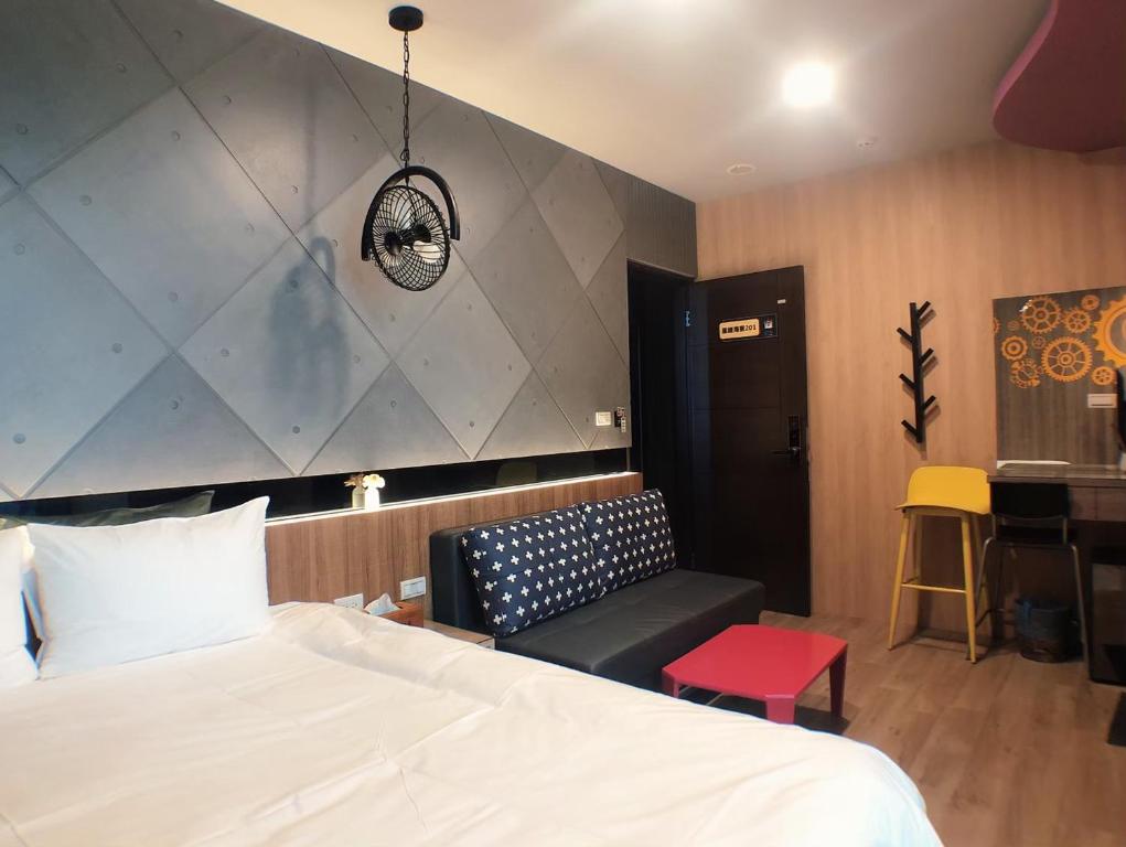 Postel nebo postele na pokoji v ubytování 陽光空氣水海景電梯民宿 Sunshine Air Water Sea View Homestay