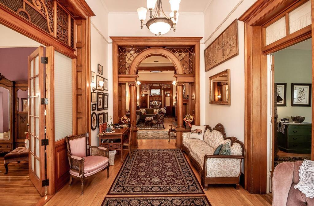 a living room with a couch and chairs at The Blenman Inn in Tucson