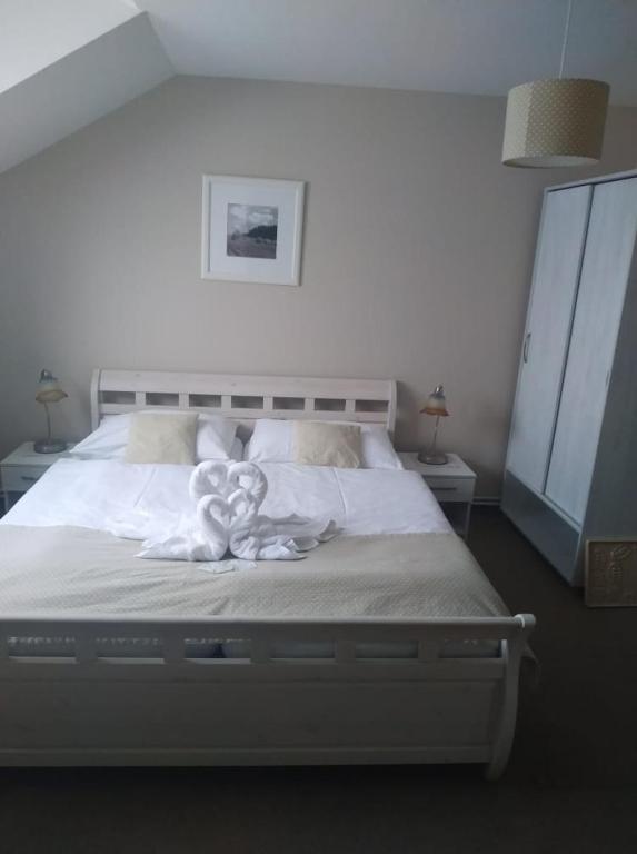 Łóżko lub łóżka w pokoju w obiekcie Hotel Panský dům
