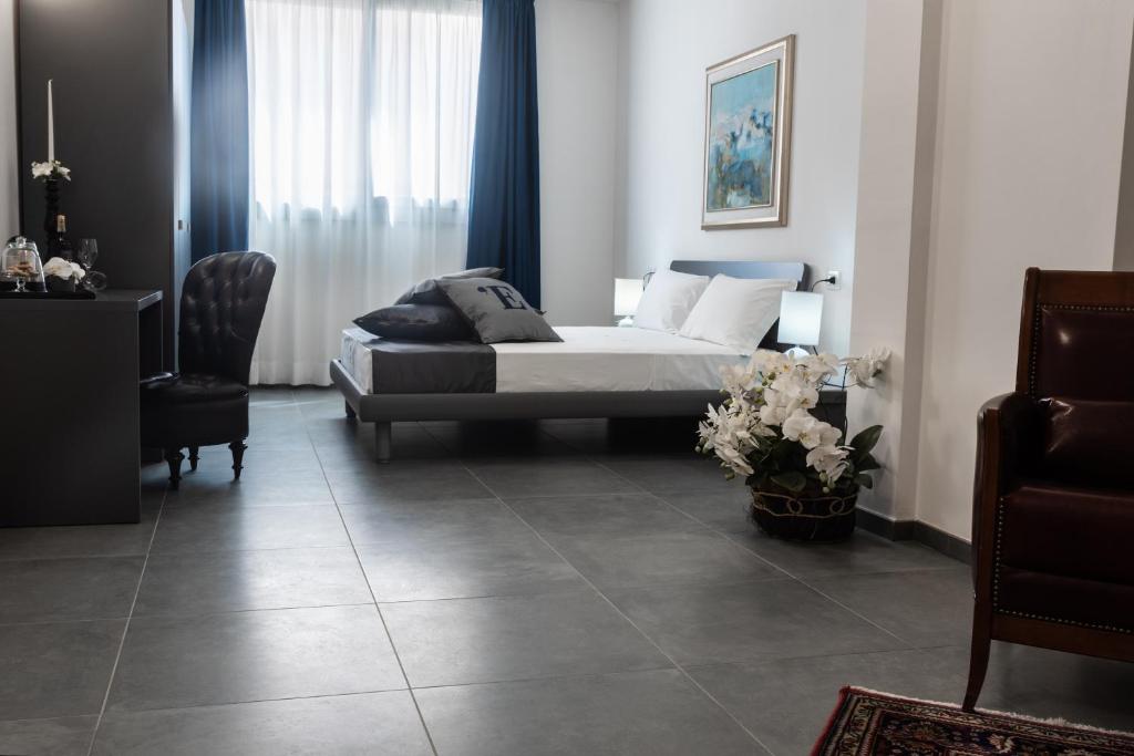 Posezení v ubytování L'Essenza Hotel
