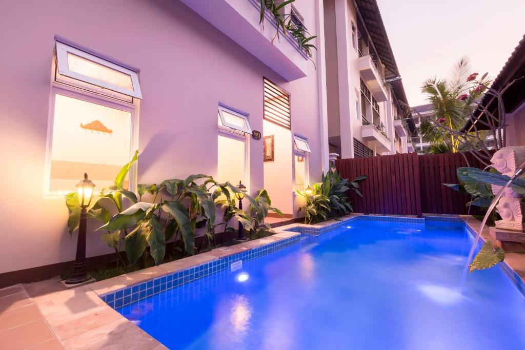 Bazén v ubytování Bali Hotel nebo v jeho okolí