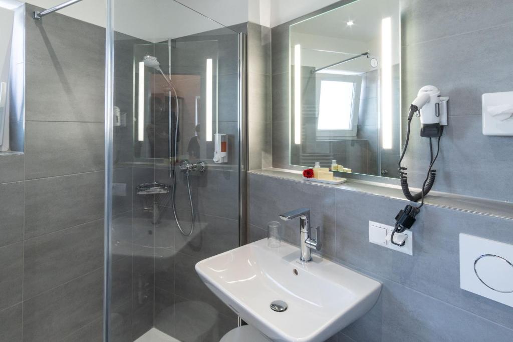 Koupelna v ubytování Hotel Elysee