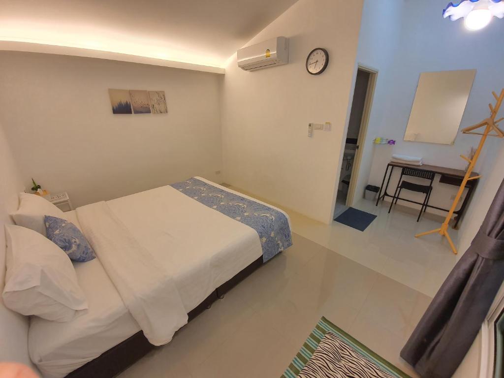 Postel nebo postele na pokoji v ubytování Napa Hostel Samrong Station
