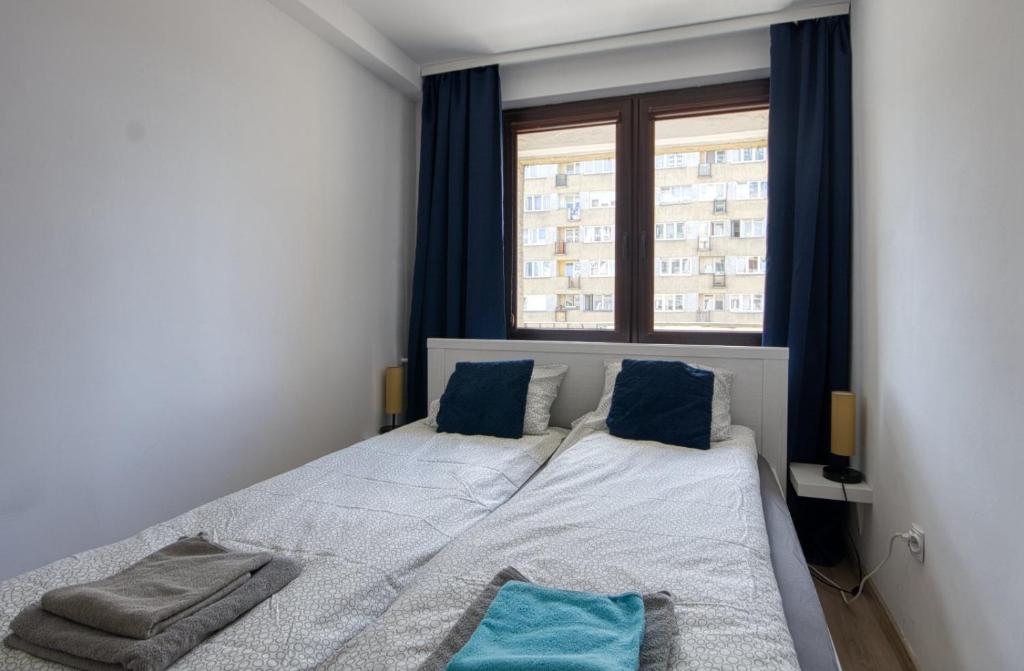 Posteľ alebo postele v izbe v ubytovaní Pańska Residence