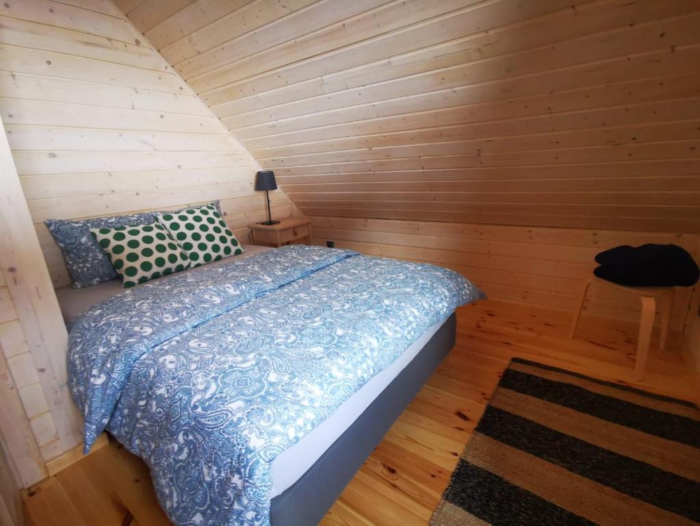 Postel nebo postele na pokoji v ubytování Chata Lisa