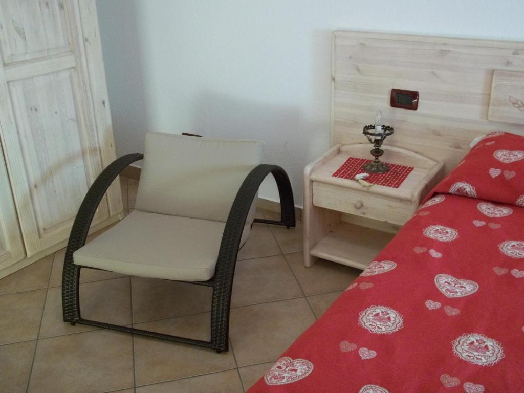 Postel nebo postele na pokoji v ubytování Affittacamere Chez Magan