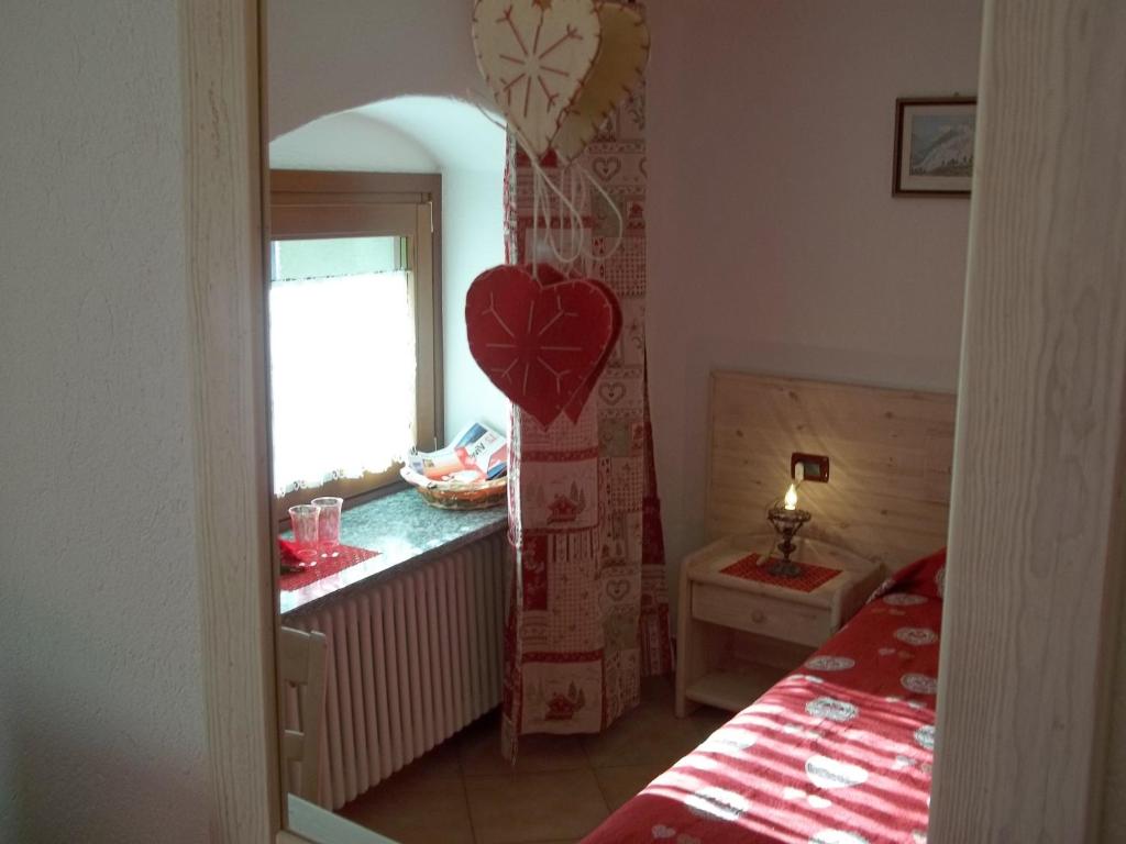 Postel nebo postele na pokoji v ubytování Affittacamere Chez Magan