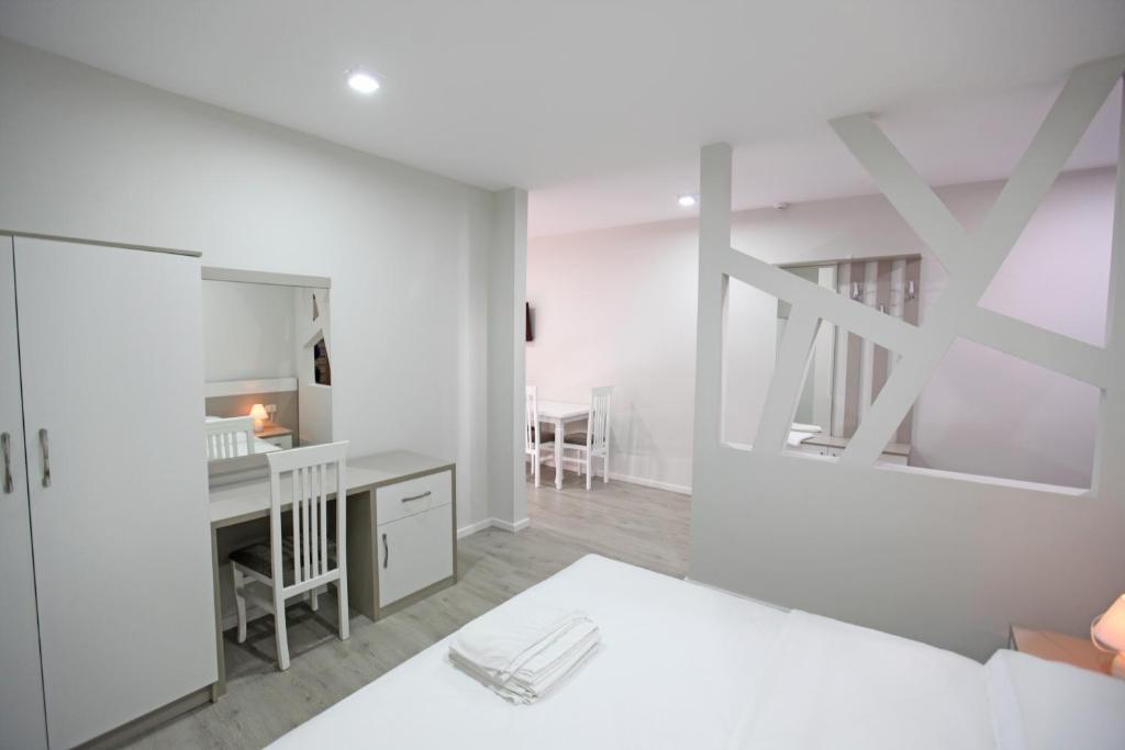 Postel nebo postele na pokoji v ubytování Star Hotel Saranda