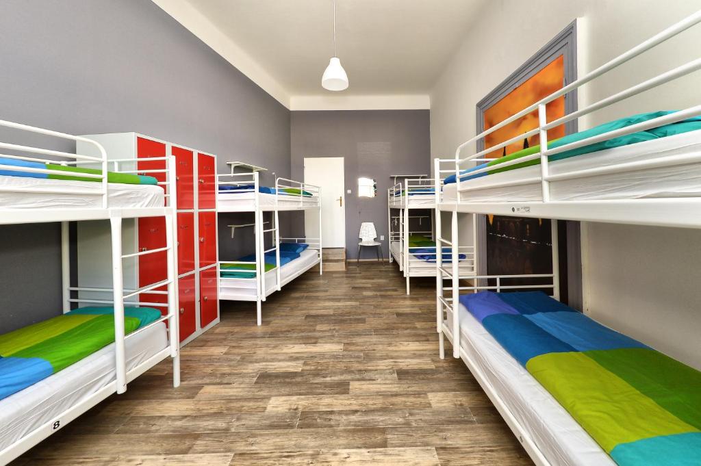 Postel nebo postele na pokoji v ubytování Onefam Home