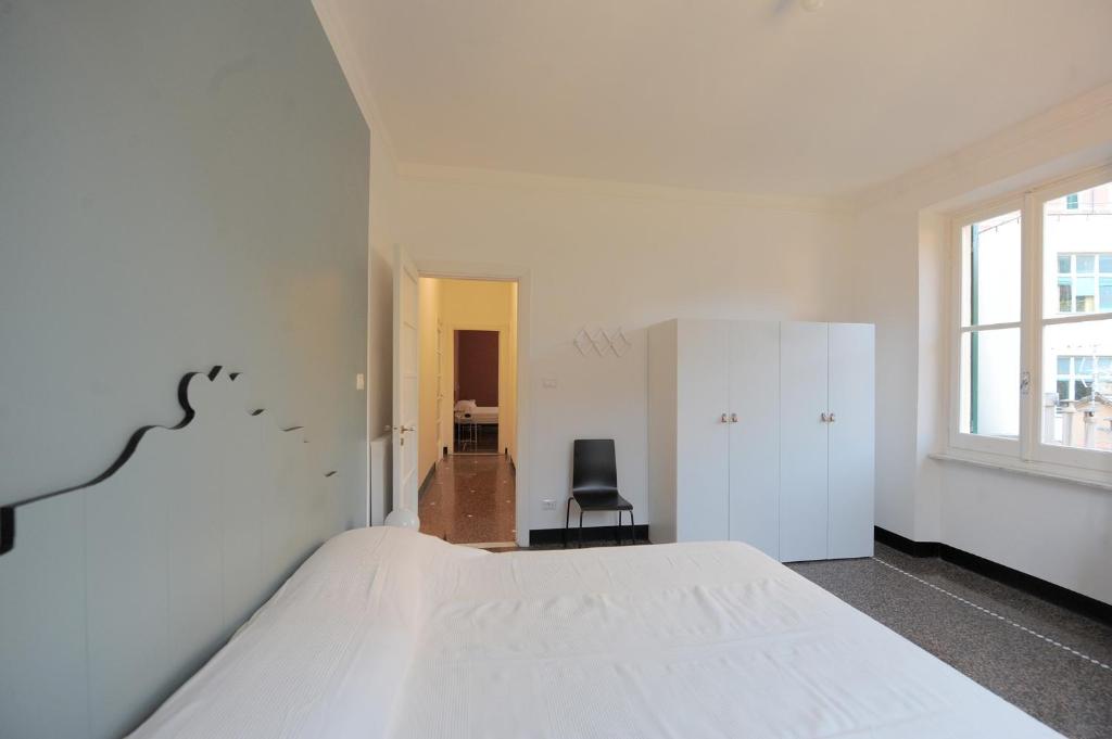 A bed or beds in a room at La Casa della Fiore
