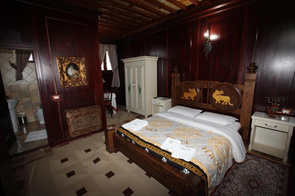 Postel nebo postele na pokoji v ubytování Hotel Iliada