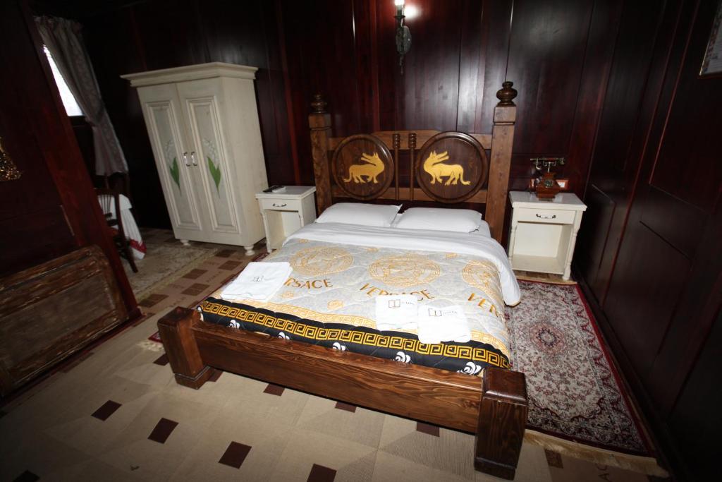 Postel nebo postele na pokoji v ubytování Hotel Iliada
