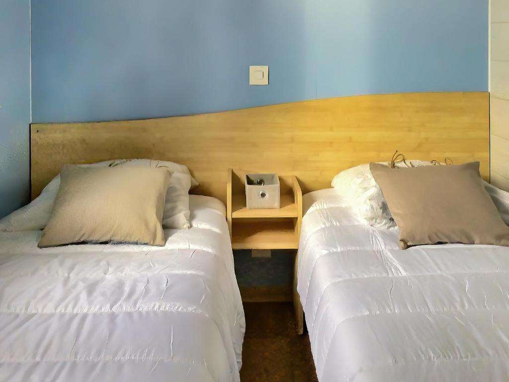 Postel nebo postele na pokoji v ubytování Camping Paradis le Moulin des Oies